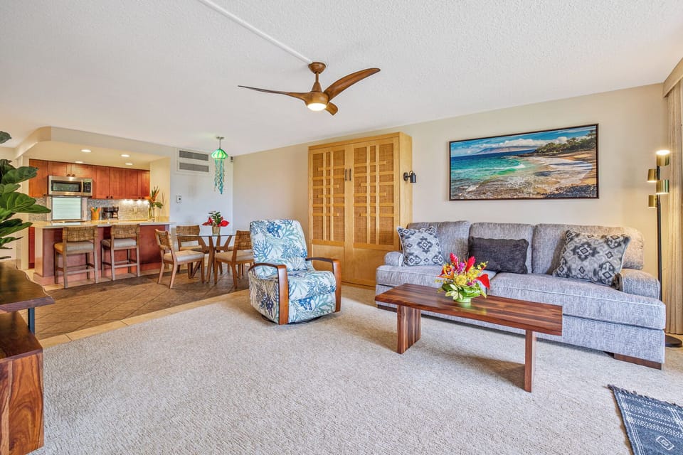 Living, dining, and kitchen areas of condo - Eldorado B102 living area with comfortable seating and island style