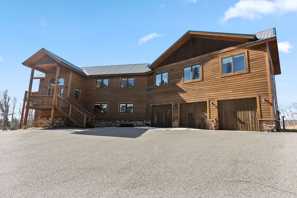 Exterior: On-site parking for 6 cars (3 in garage, 3 in driveway)