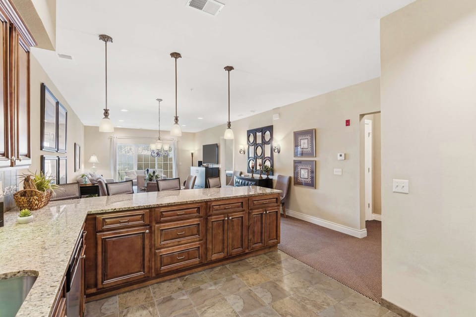 The open kitchen offers ample space & all the comforts of home​