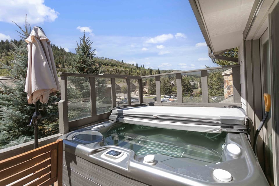 Condo, 4 Bedrooms | Outdoor spa tub