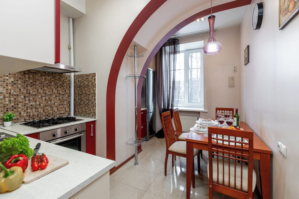 Deluxe Apartment, Non Smoking, Courtyard View | Private kitchen | Electric kettle, cleaning supplies, paper towels