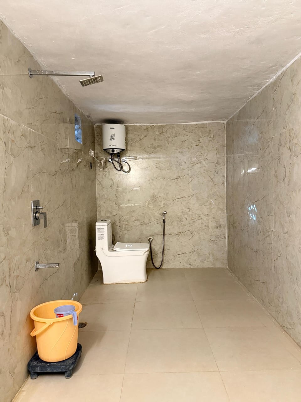 Shower, slippers, towels, soap