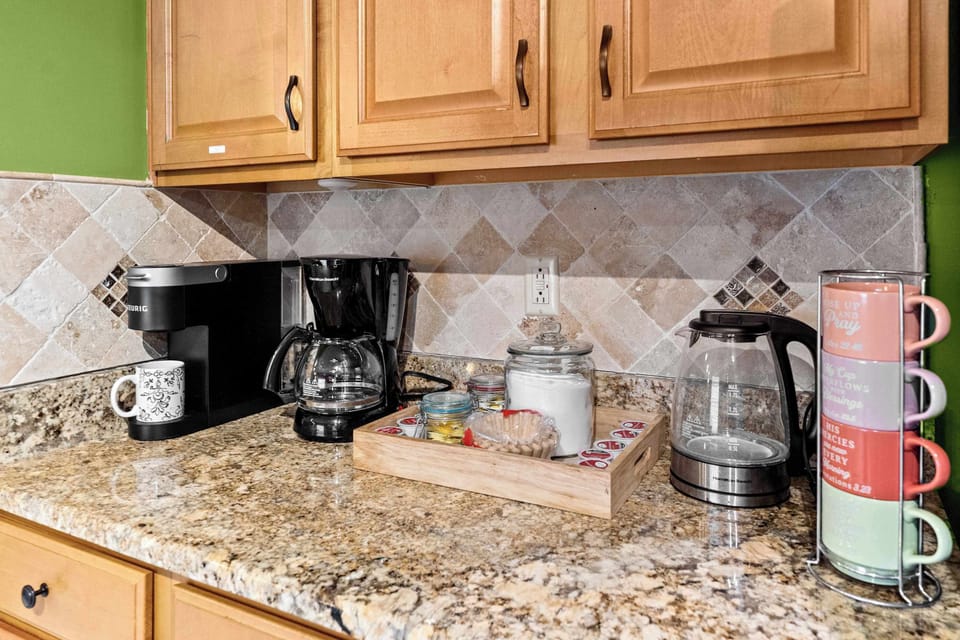 coffee station with keurig and drip coffee makers on granite countertop