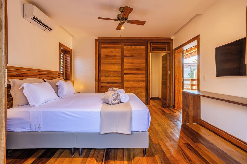 Comfort Suite, Pool View | Premium bedding, in-room safe, free WiFi, bed sheets