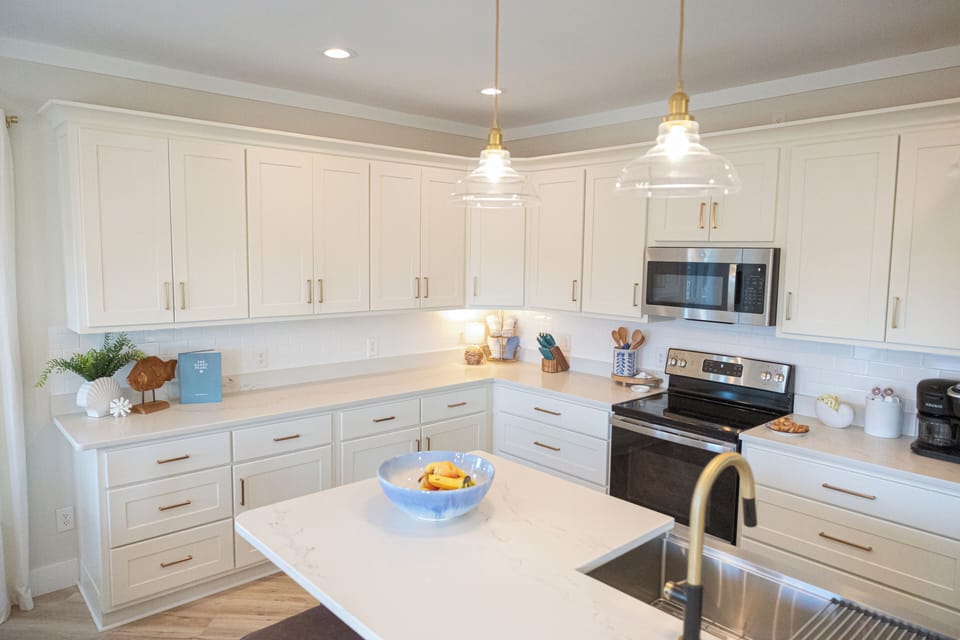 Full size kitchen completely stocked for all cooking needs 