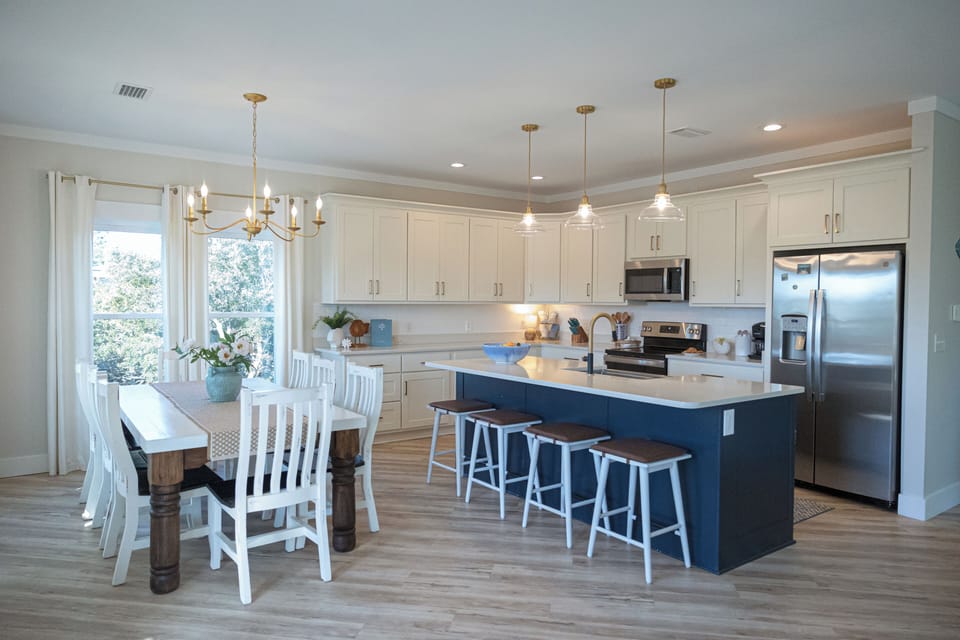 Seating for 12 in our open concept kitchen and dining area
