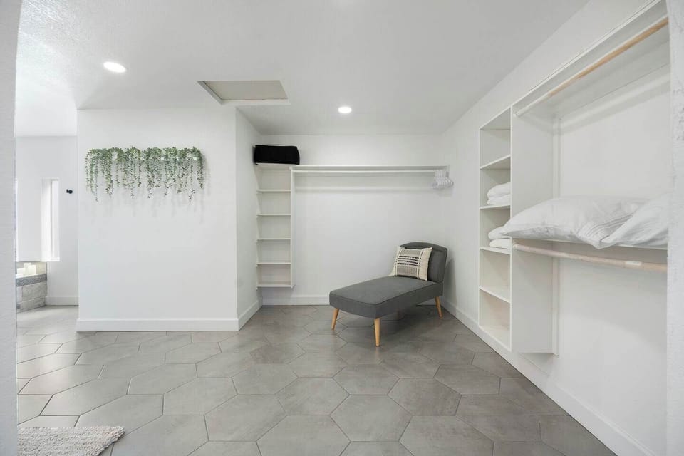 Walk-in closet with built-ins right off the bathroom
