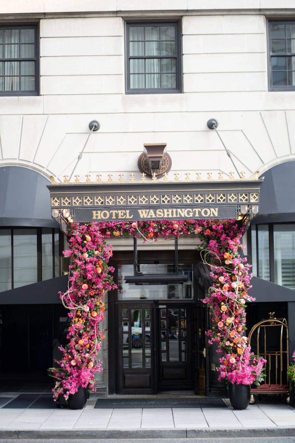 Step through a flower-framed entrance and feel instantly welcomed.
