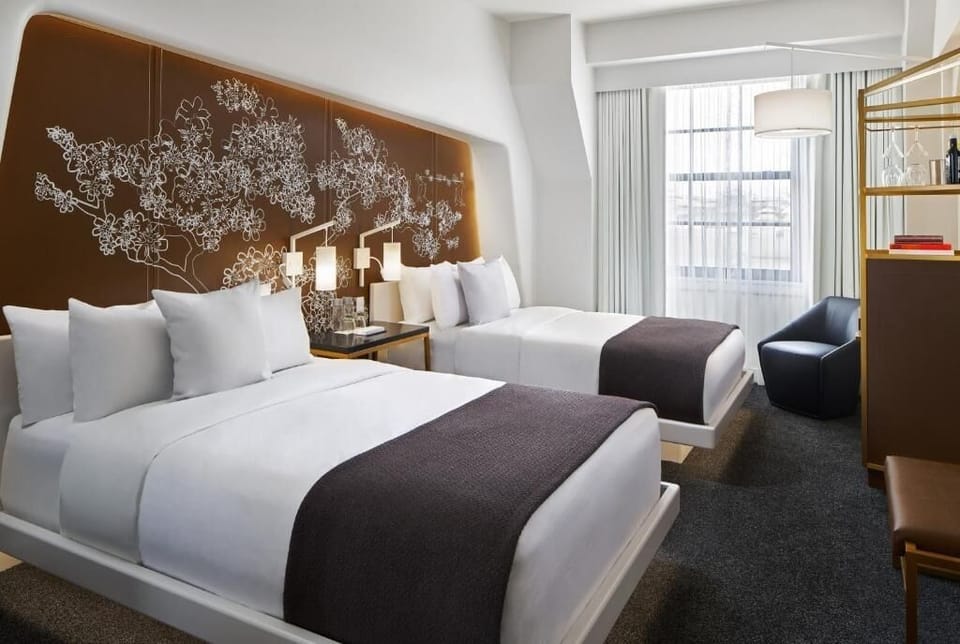 Recharge after adventures in a spacious, airy double-queen room.