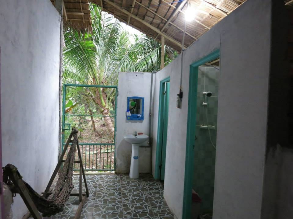 Single Bed in Shared Dormitory | Bathroom | Shower, free toiletries, slippers, towels