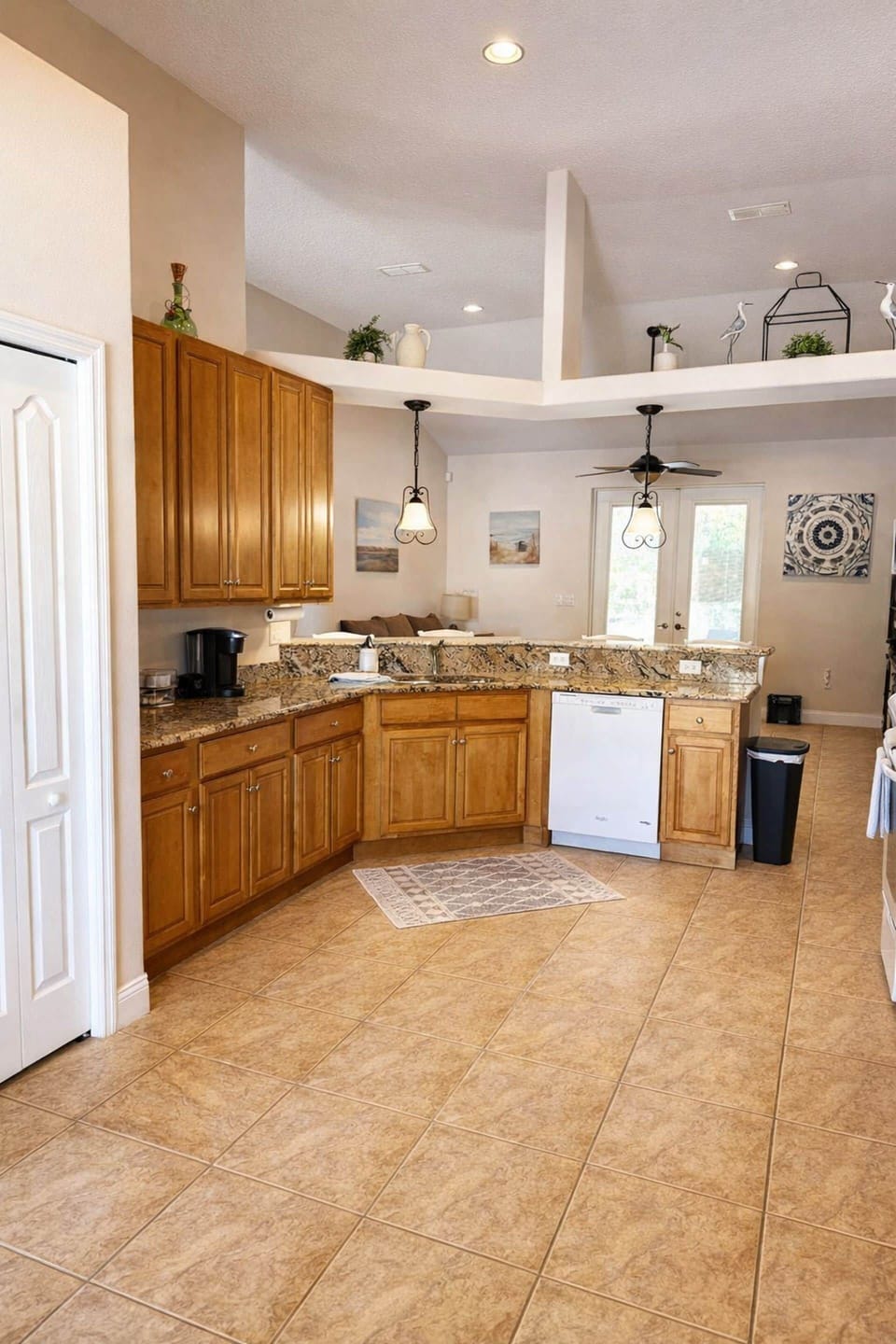 Massive kitchen with expansive granite counters, tons of prep space, and endless storage