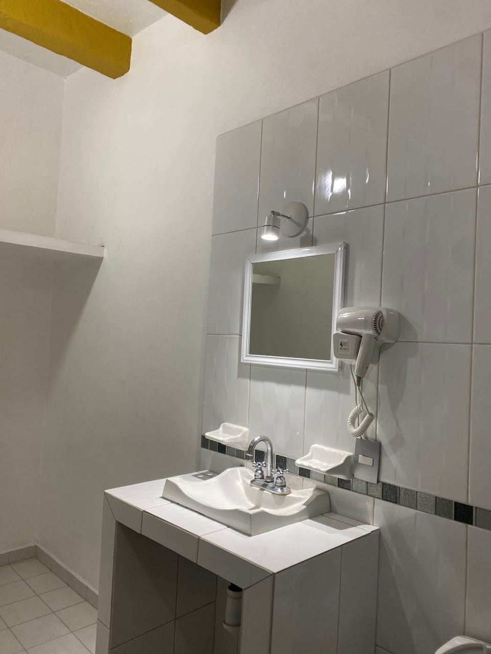 Family Triple Room | Bathroom | Shower, hair dryer, towels, soap