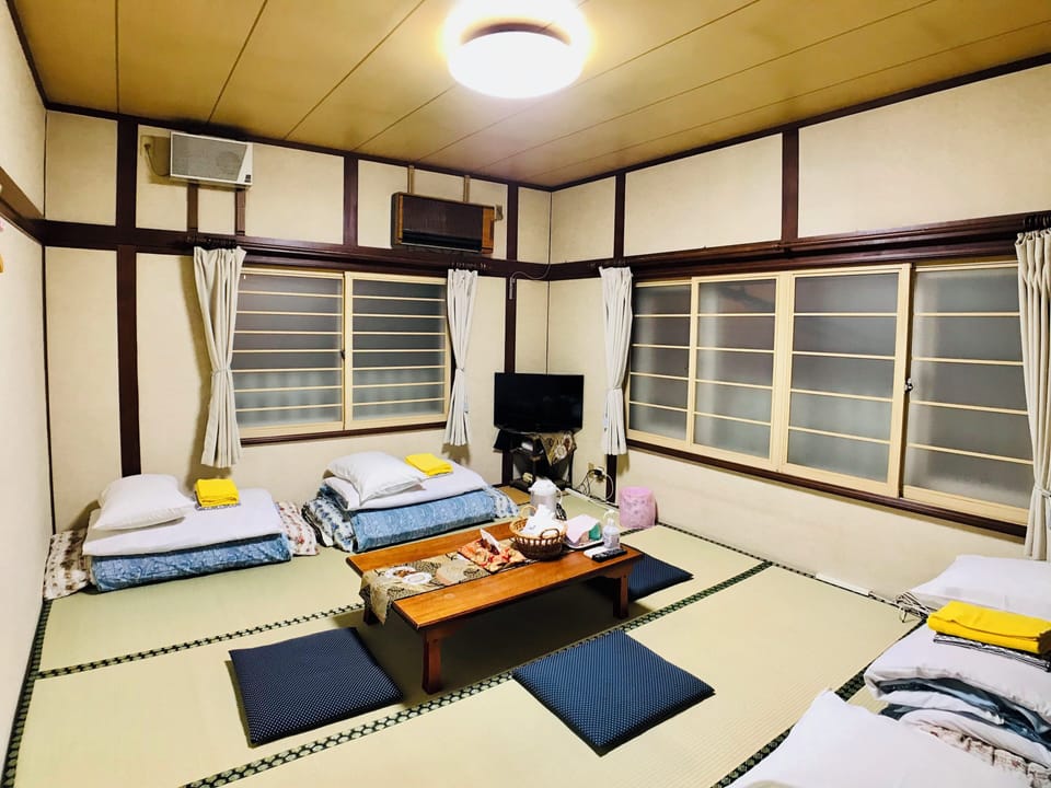 Japanese-Style Family Room with Shared Bathroom | Individually decorated, individually furnished, desk, iron/ironing board