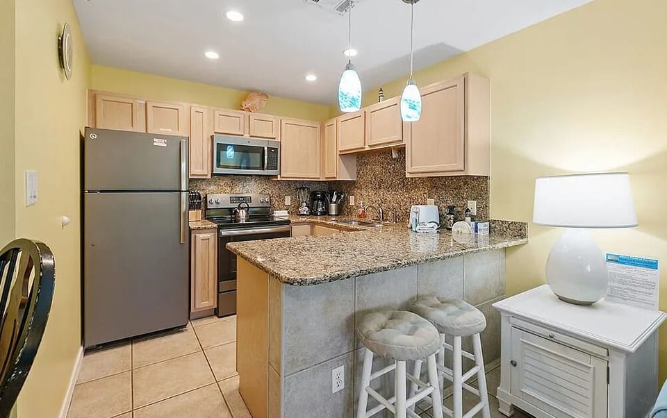 Condo, 1 Queen Bed with Sofa bed (Grand Caribbean West 109) | Private kitchen