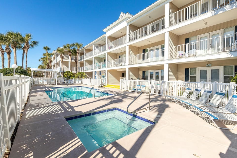 Condo, 1 Queen Bed with Sofa bed (Grand Caribbean West 109) | Pool | Outdoor pool, a heated pool