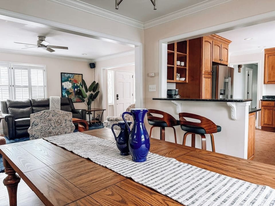 Enjoy a meal at our dining table and chat across the room with our open floorplan