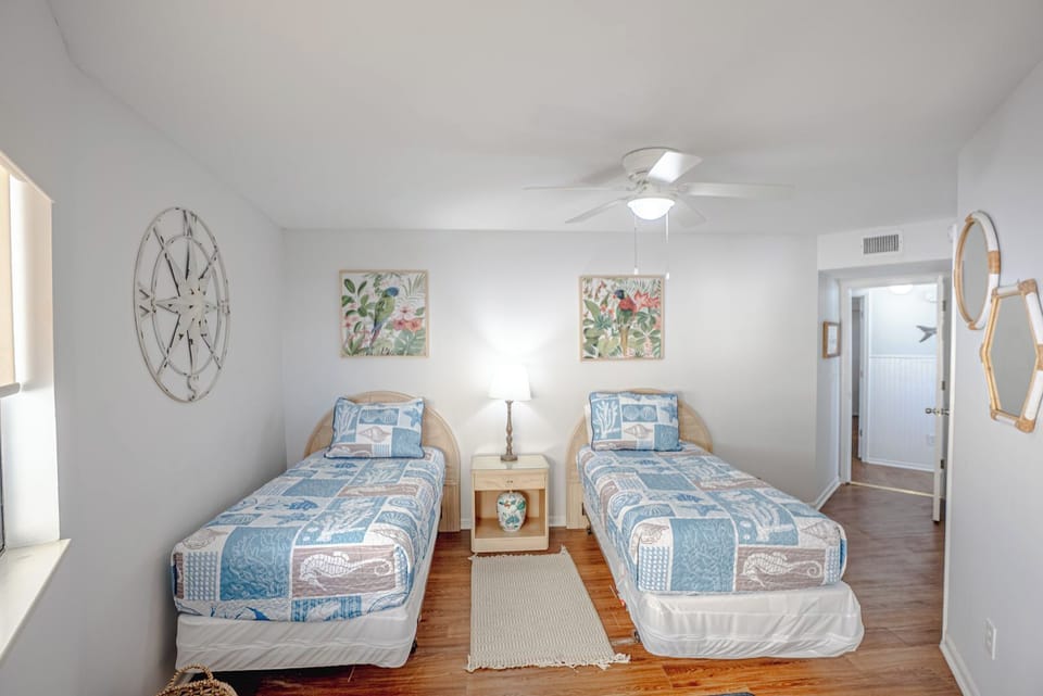 Bedroom 2 offers 2 twin beds.