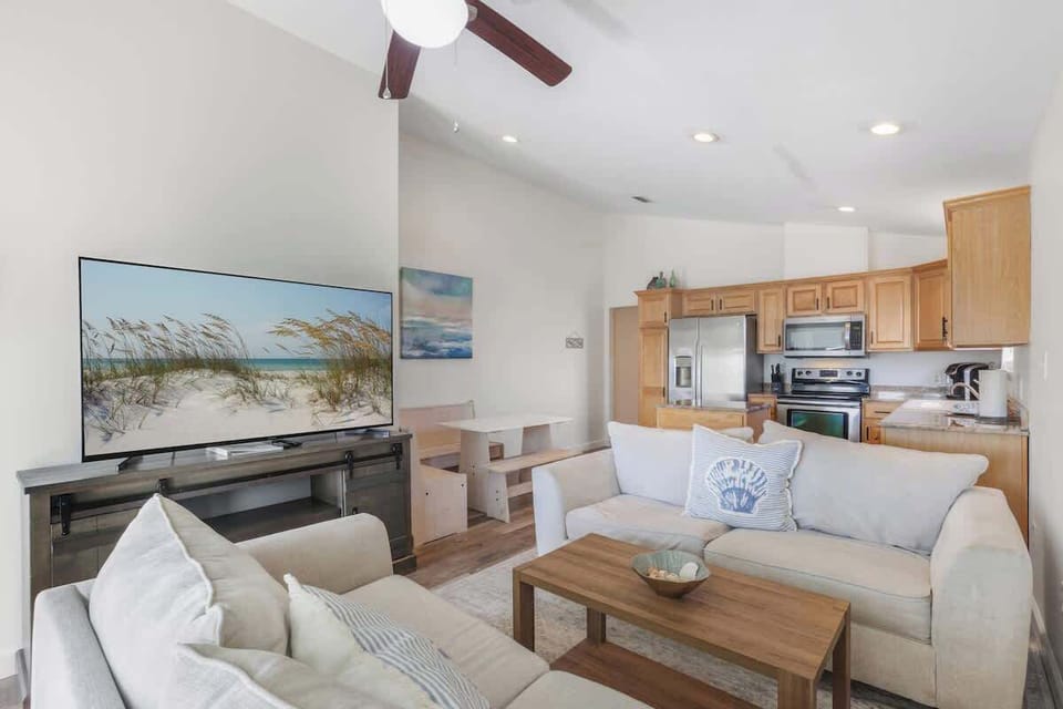 One of two living rooms, perfect for movie nights, morning coffee, or winding down after a beach day.