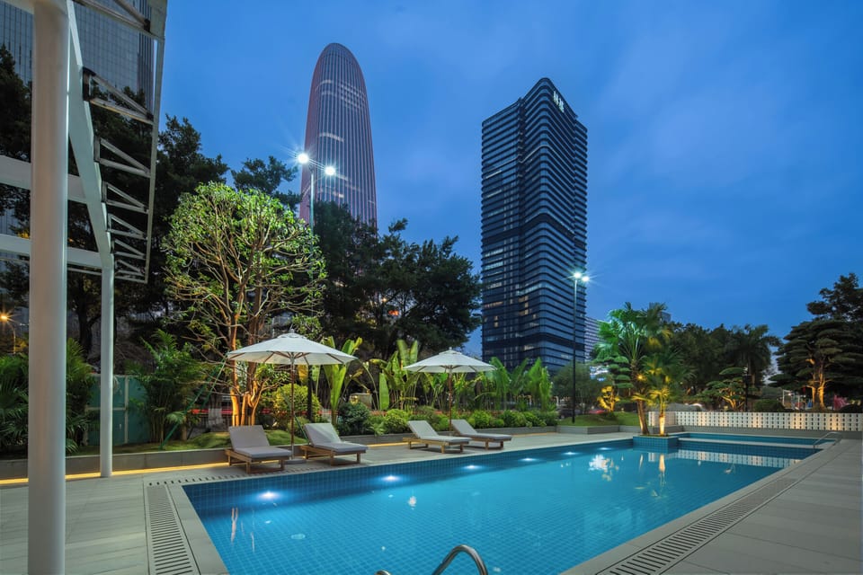 Outdoor pool, pool umbrellas, sun loungers