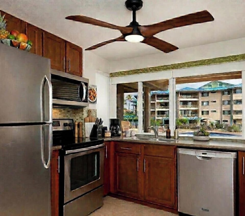 Kitchen with stainless appliances and many amenities of home.