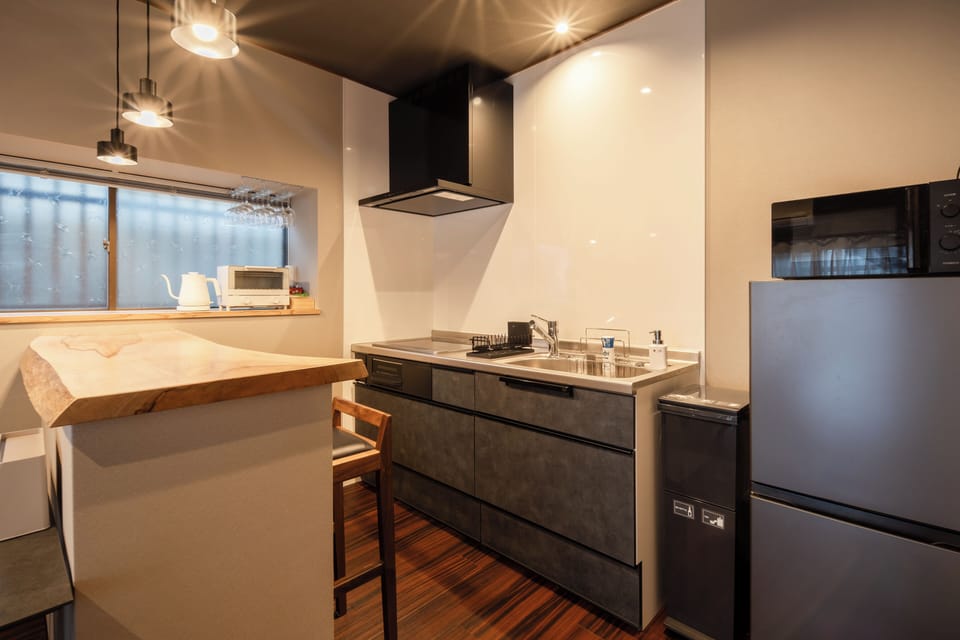 Comfort House, Balcony, Garden View | Private kitchen | Full-size fridge, microwave, oven, electric kettle