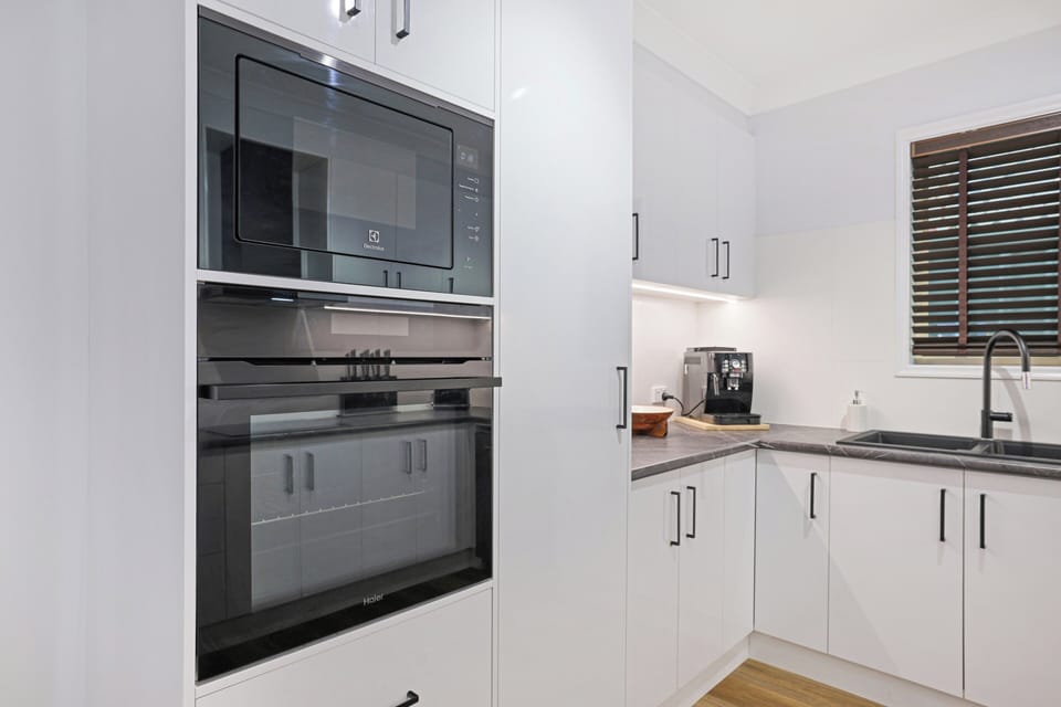 Appliance wall and coffee area within the full kitchen layout.