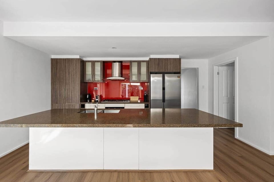 A well-equipped kitchen with plenty of space for everyday cooking, whether it’s a quick breakfast or a shared meal.