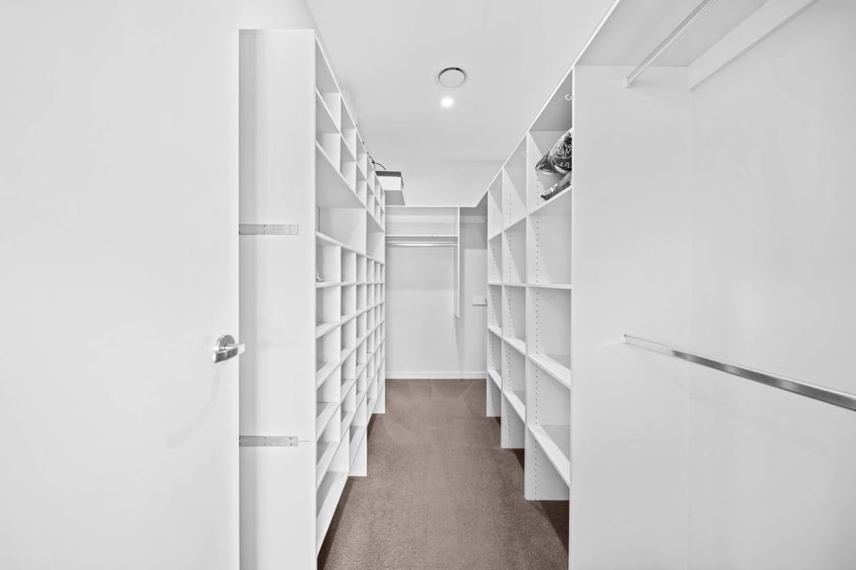 Master bedroom walk in closet. 