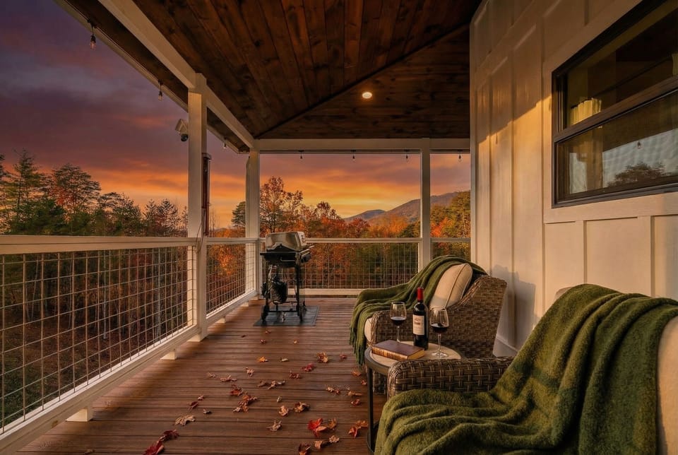 Cozy up with a glass of wine or fire up the grill beneath the warm glow of the covered balcony.