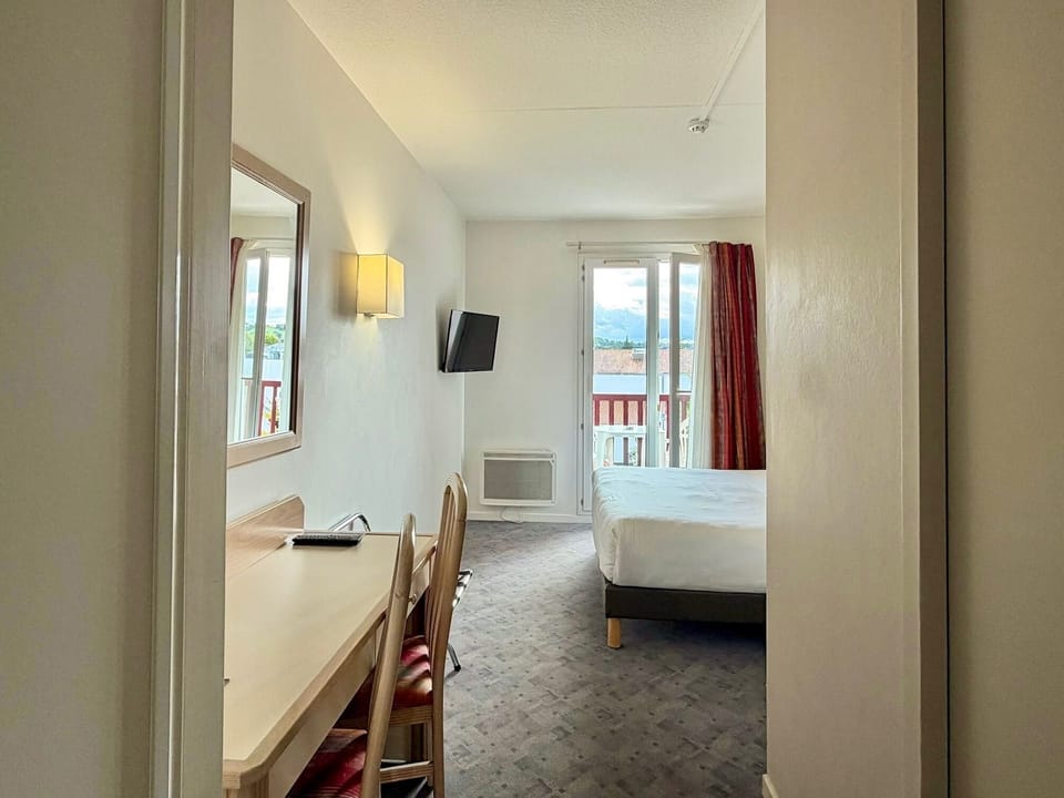 Desk, blackout drapes, iron/ironing board, free WiFi