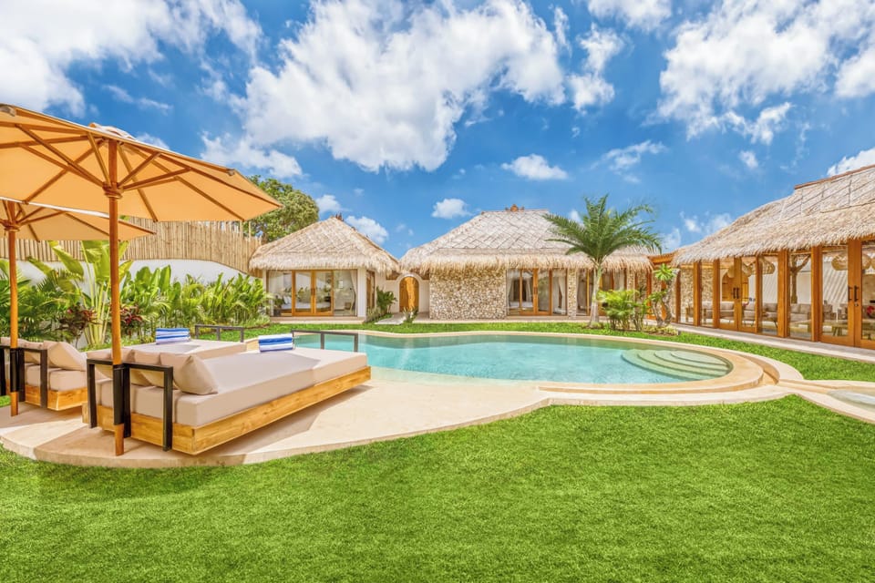 Enjoy a dip in the pool surrounded by soft light and calm air