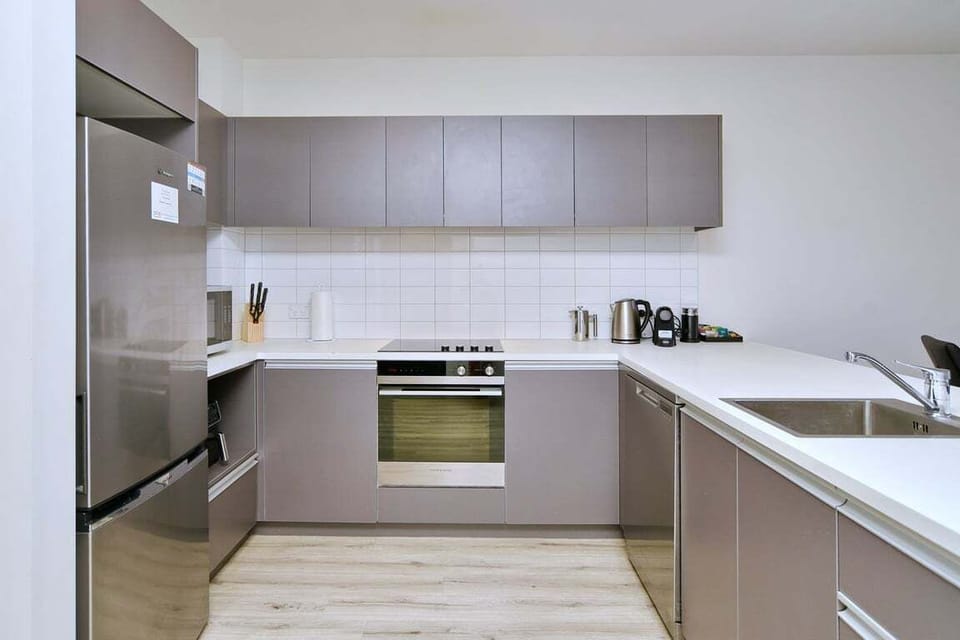 Arrive to a sleek, fully equipped kitchen designed for easy meals