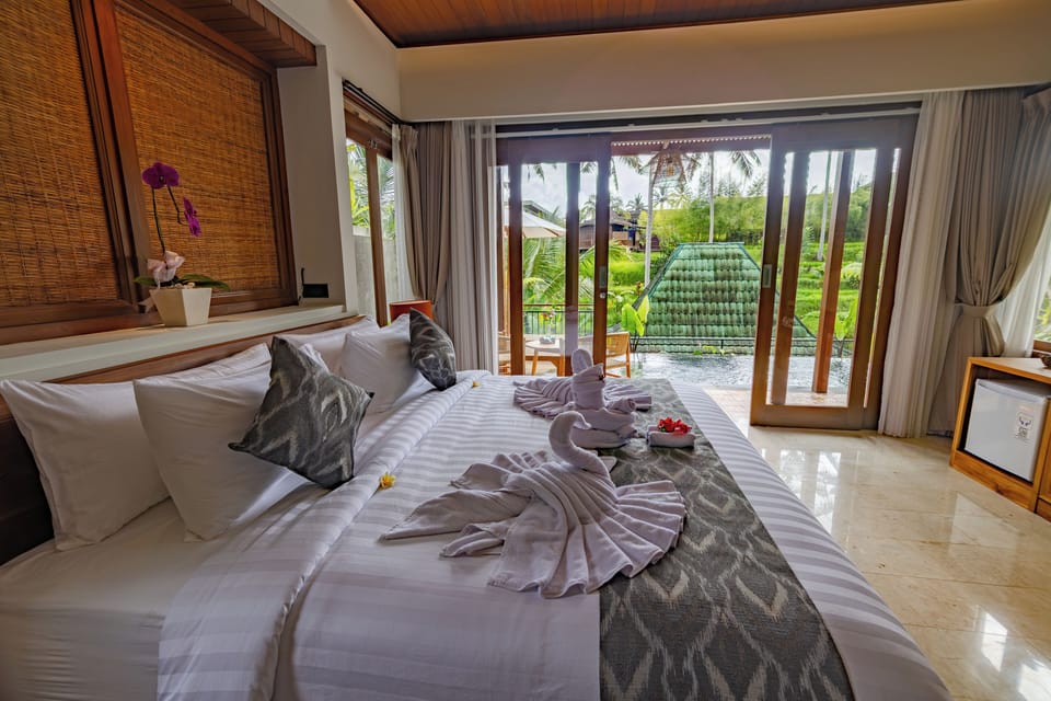 Honeymoon Villa, Pool View | Pillowtop beds, minibar, in-room safe, desk
