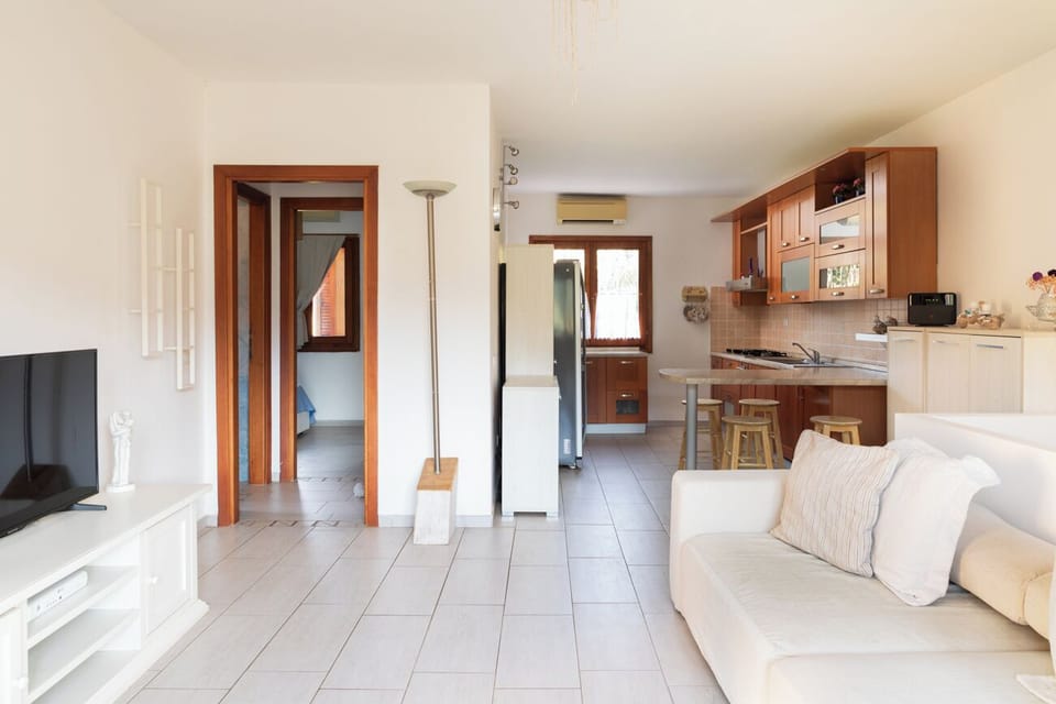 Apartment, 3 Bedrooms | Living area | 30-inch TV with satellite channels