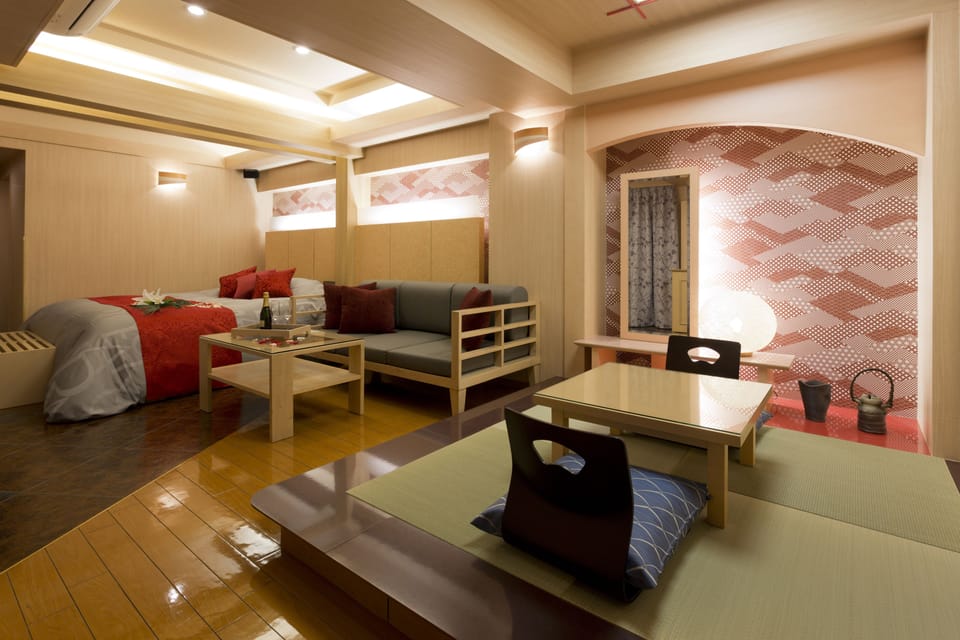 xxx Superior Double Room | Down comforters, minibar, desk, blackout drapes