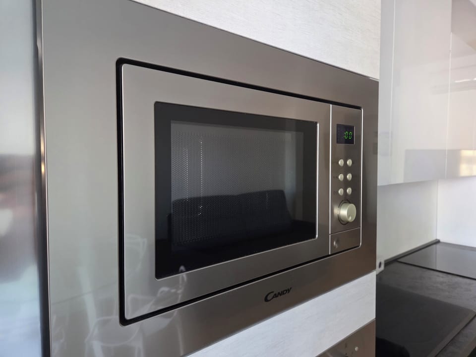 Deluxe Apartment | Private kitchen | Shared fridge, microwave, stovetop, espresso maker