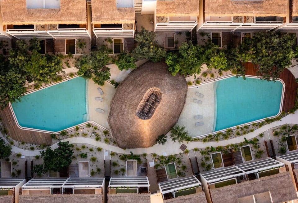 2 Giant Courtyard Pools with Palapa in the Middle