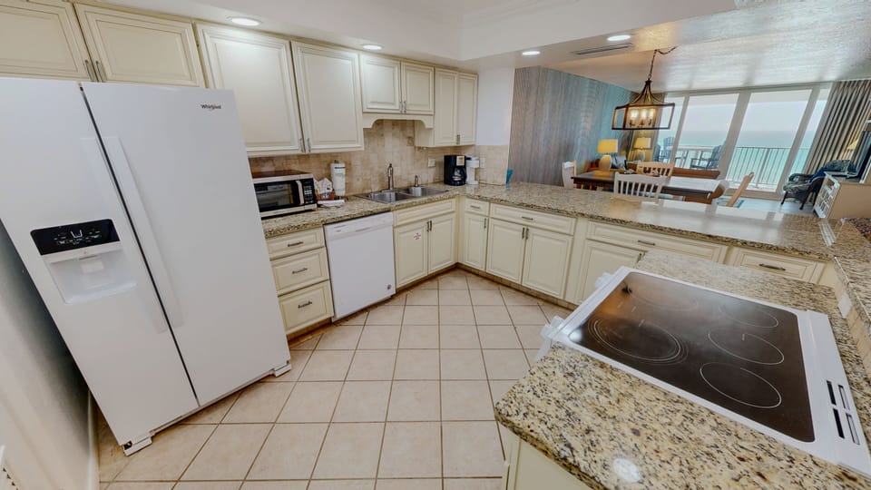 Condo, 2 Bedrooms | Private kitchen | Fridge, oven, coffee/tea maker, toaster