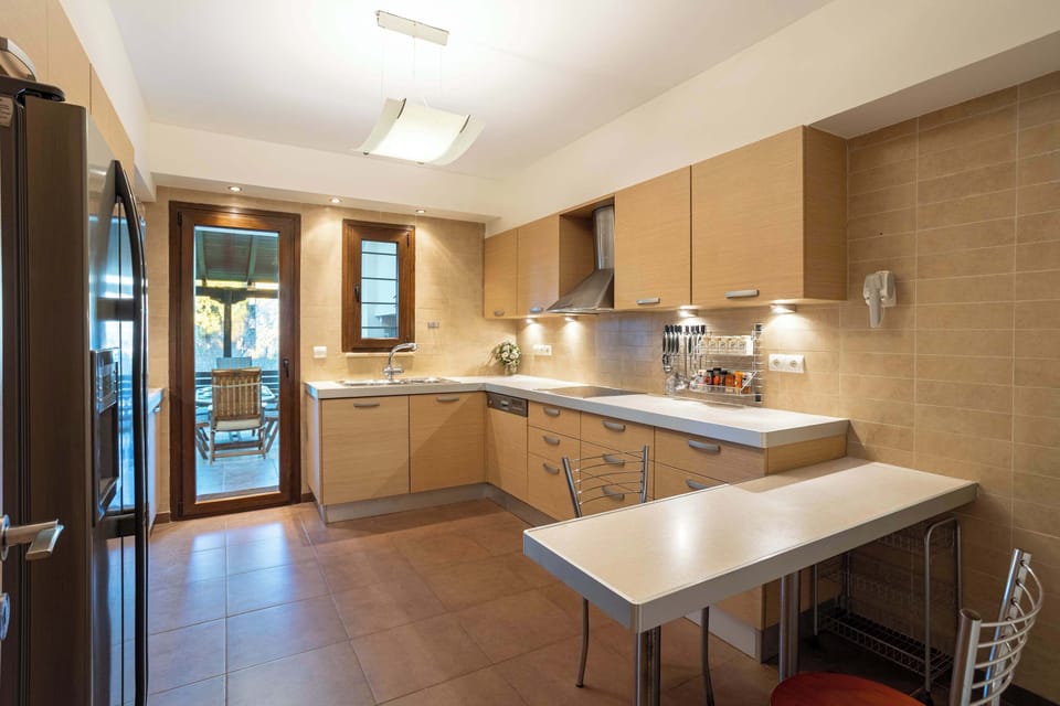 Fully Equipped Open Kitchen with Central Island