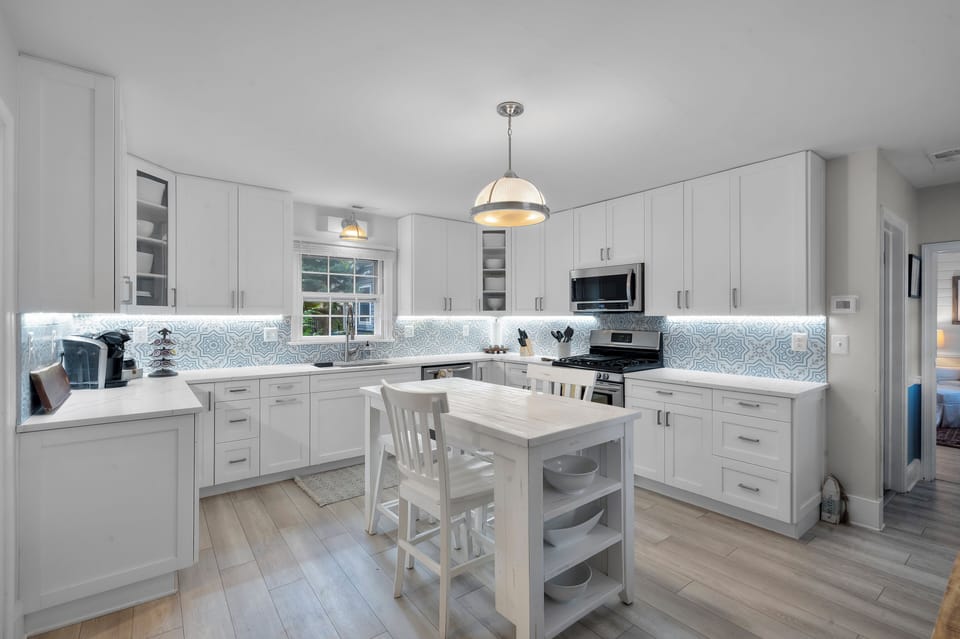 Kitchen with entrance to living room