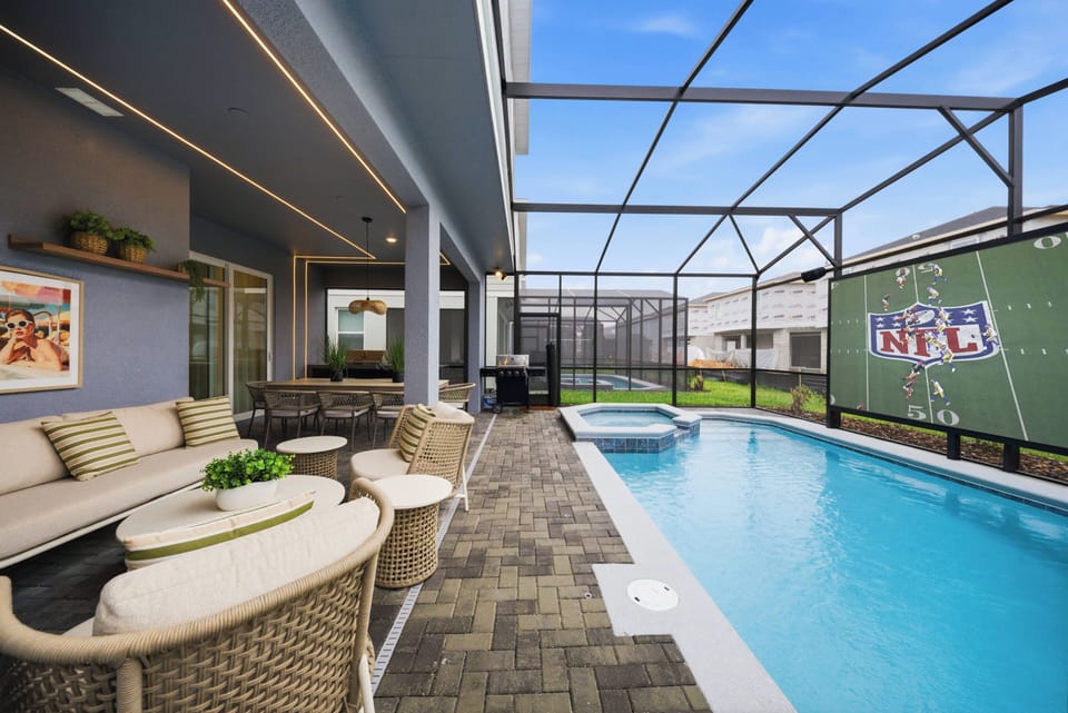 Step into your private oasis, where cozy seating encircles a shimmering pool, inviting you to relax under the sky. With sleek paver stones and modern decor, it’s the ideal spot to unwind after a day of adventure.