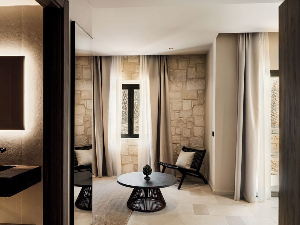 Family Deluxe Terrace Suite | Living area | 55-inch flat-screen TV with digital channels