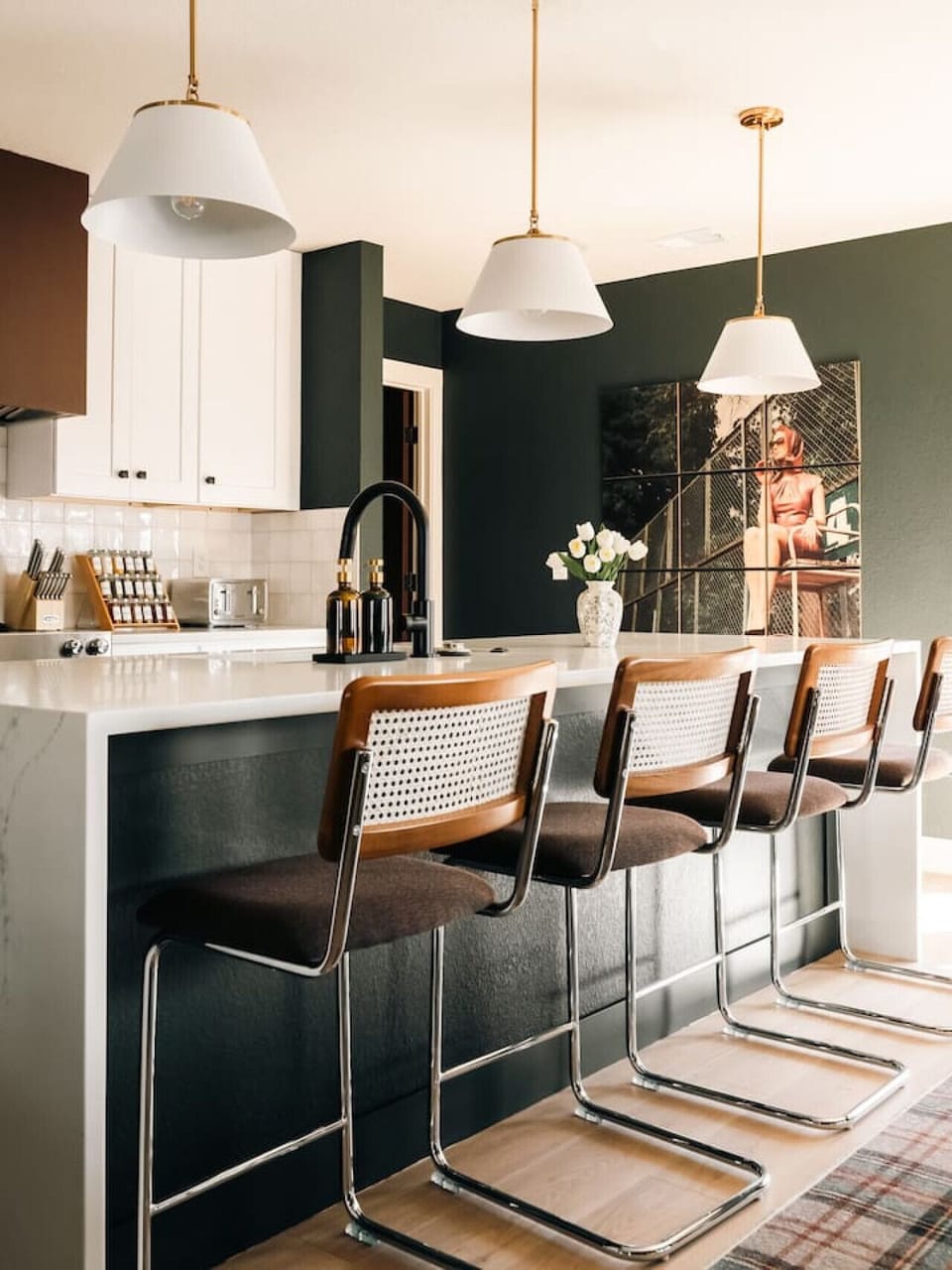 Fully equipped chef`s kitchen with designer finishes and bar seating