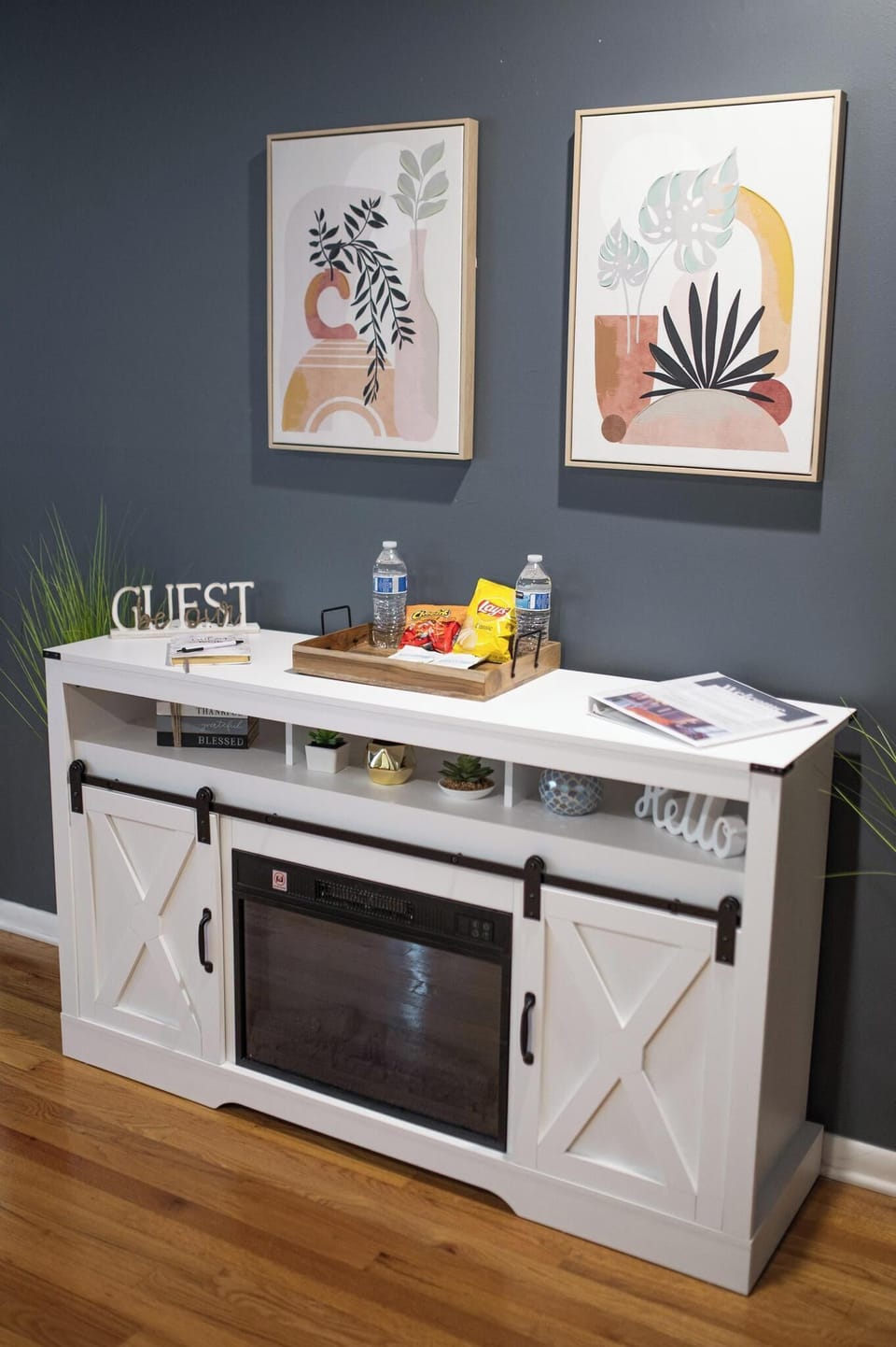 The welcome center includes an electronic fireplace, adding both ambiance and co