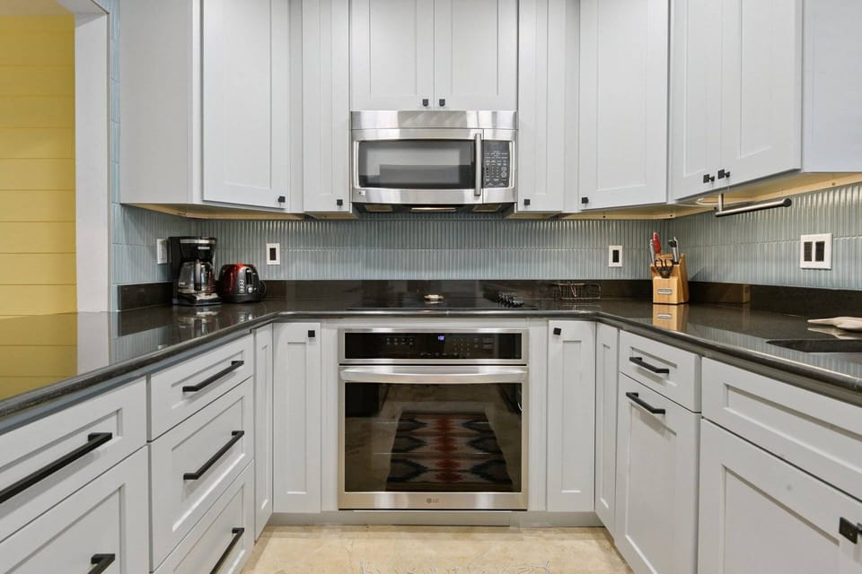newly renovated kitchen with modern appliances to enjoy meals at home