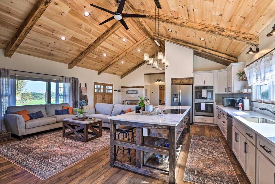 Begin your day at the island and end it fireside. This open retreat is made for shared stories and quiet moments alike.