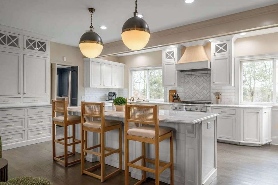 French doors from the family room open to the outdoor spaces — you will find someone on both
sides of that threshold at any given time of day.