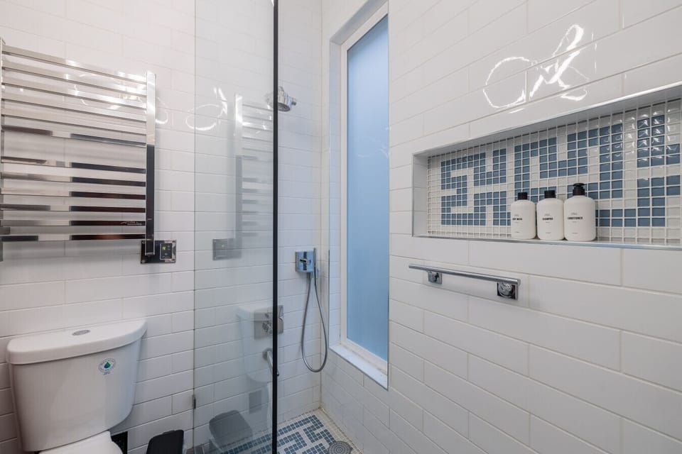 Private en-suite bathroom stocked with essentials