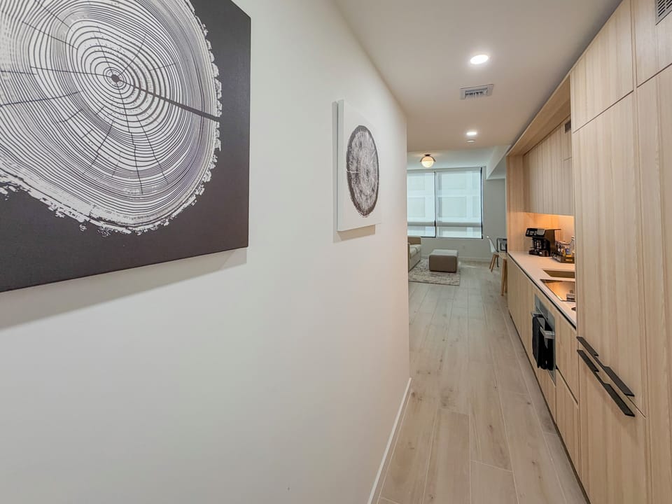 Hallway: Bright and airy entrance leading to a stylish living space.