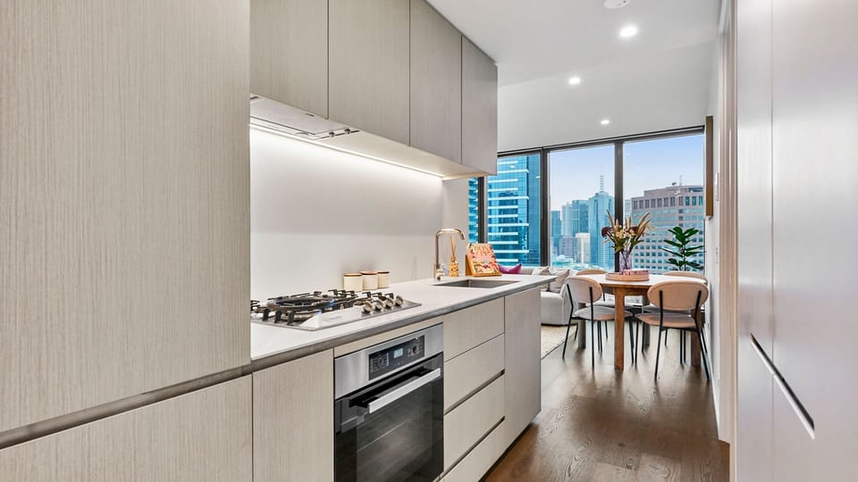 Sleek modern kitchen with full appliances